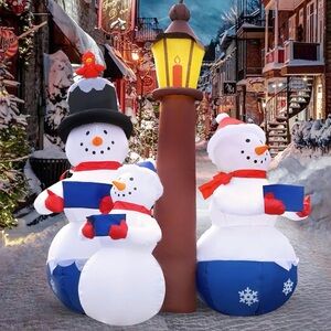 6.6 ft tall Festive Snowman Family Inflatable with Lamp Post